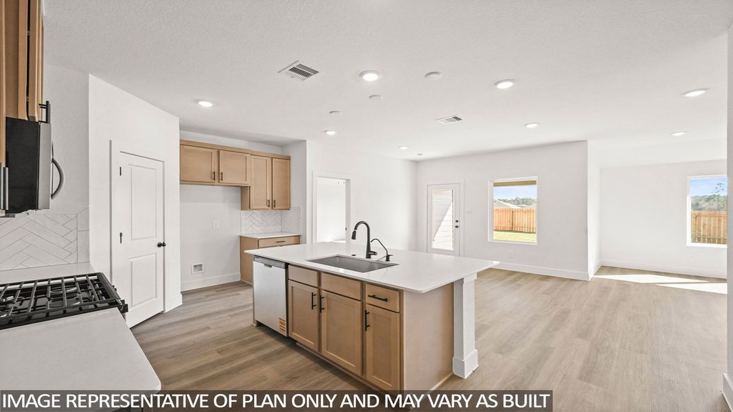 Furnished interior view inside a new home in Sunterra Lakes, Brookshire (Image 4). Furnished interior view inside a new home in Sunterra Lakes, Brookshire (Image 4).