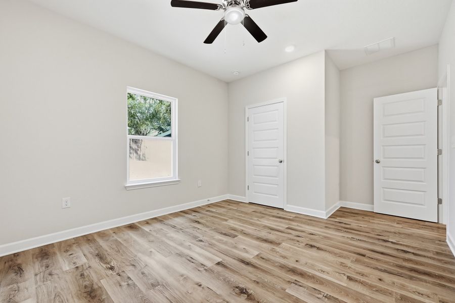 Spacious, unfurnished interior of a new home in Southern Charm, Crestview (Image 17).