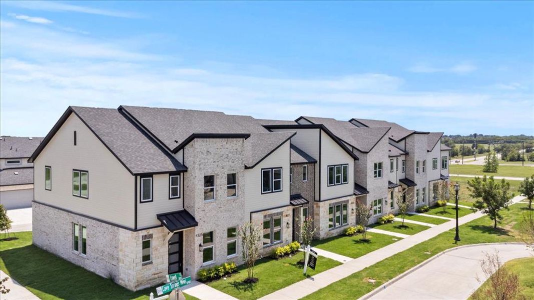 Front exterior of a new home in , Rowlett, TX, highlighting curb appeal (Image 16).