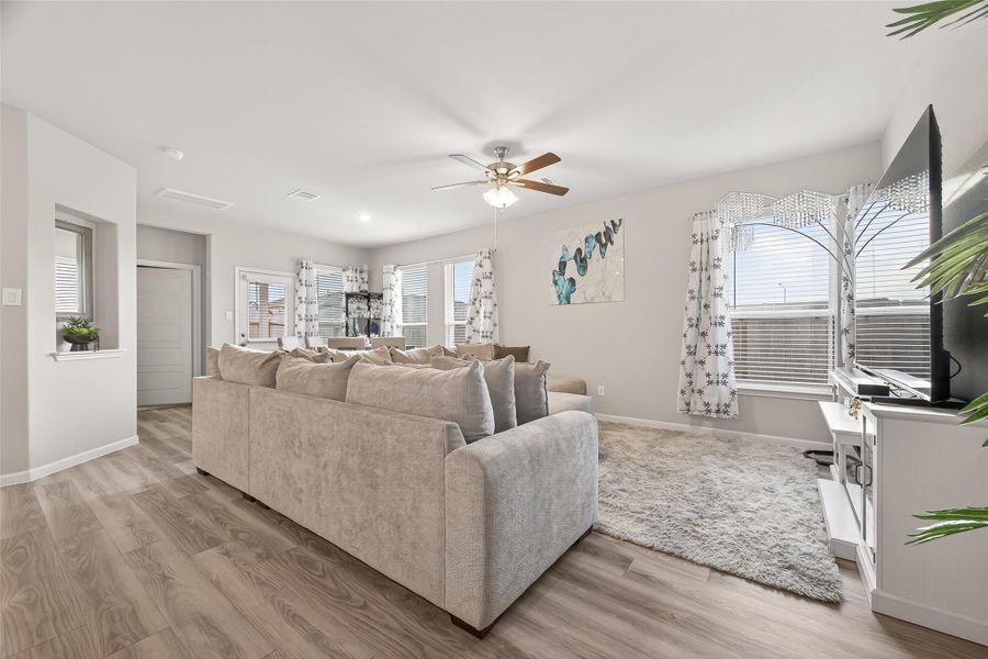 Furnished interior view inside a new home in Sunterra, Katy (Image 9).