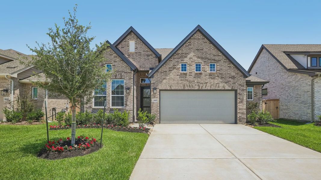Representative exterior photo of a completed home built from the Oxford by Chesmar Homes in Parkside on the River, Georgetown, TX (Image 20).