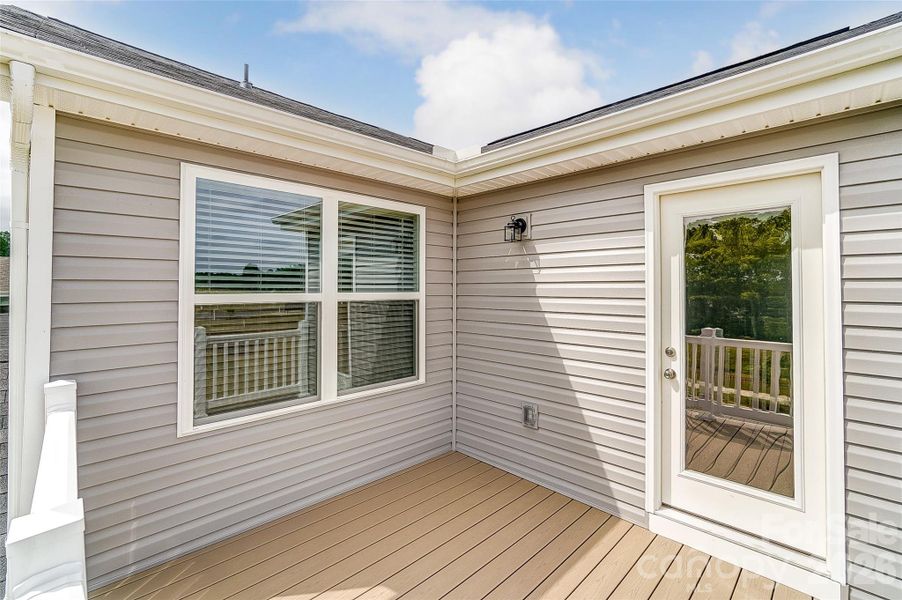 Exterior details and patio area of a home in Cheyney, Charlotte (Image 3).