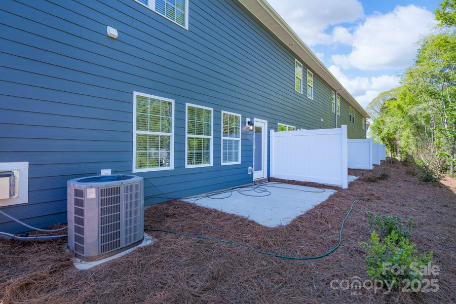 Exterior details and patio area of a home in Pine Trace, Gastonia (Image 3).
