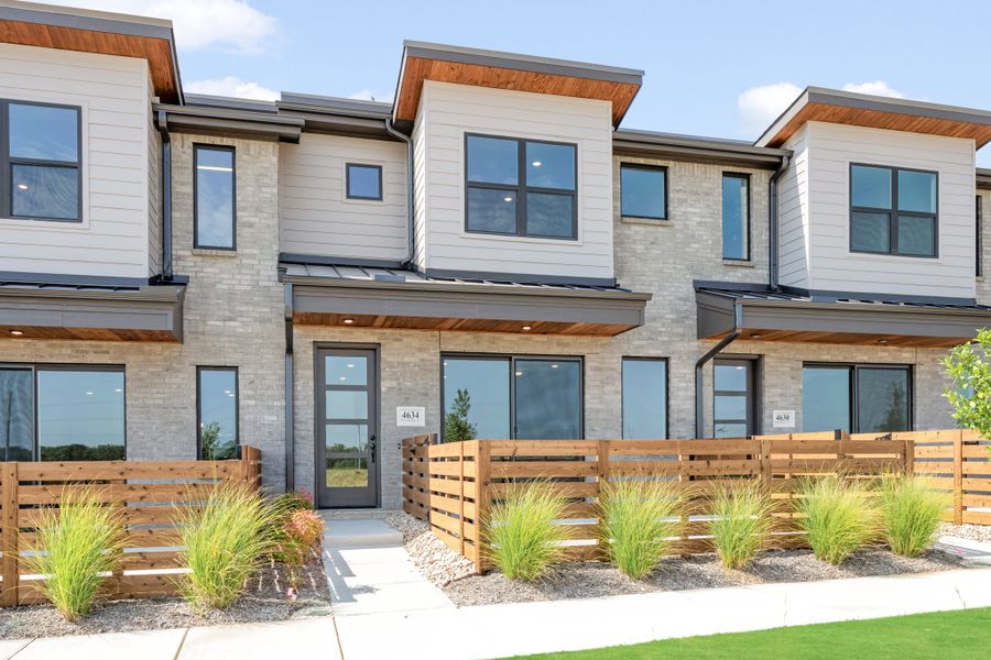 Front exterior of a new home in Wildridge, Oak Point, TX, highlighting curb appeal (Image 27). Front exterior of a new home in Wildridge, Oak Point, TX, highlighting curb appeal (Image 27).