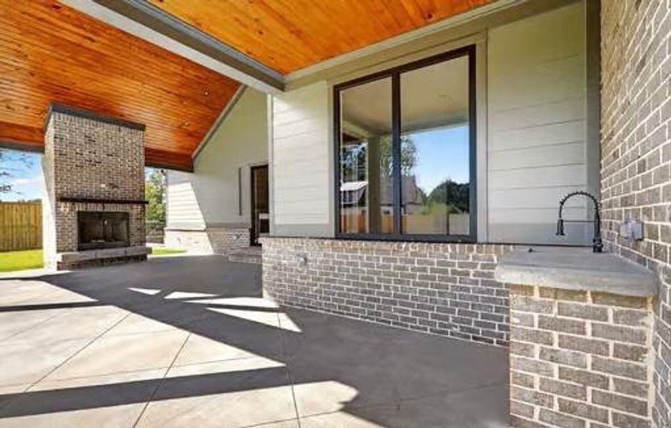 Front exterior of a new home in , Cumming, GA, highlighting curb appeal (Image 24).