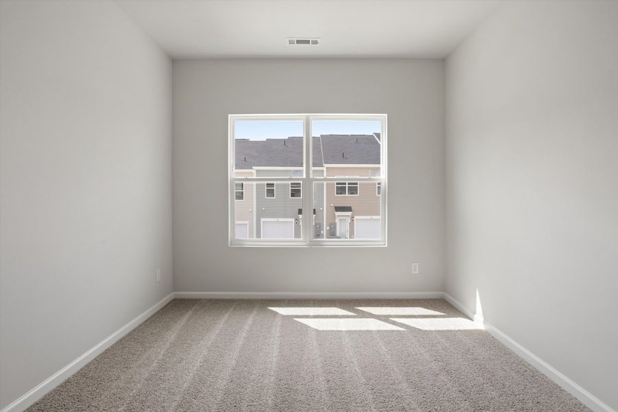Spacious, unfurnished interior of a new home in Renaissance at White Oak, Garner (Image 26).