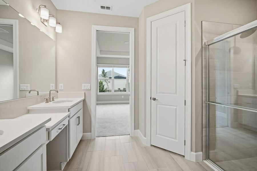 Furnished interior view inside a new home in Esplanade at Wiregrass Ranch, Wesley Chapel (Image 8).