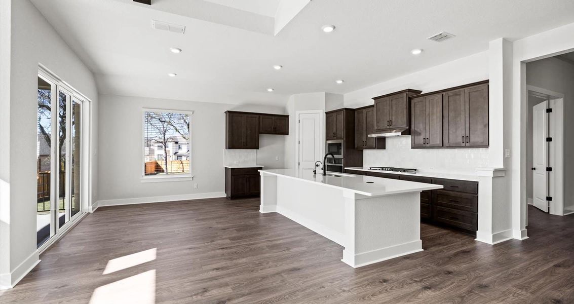 Furnished interior view inside a new home in 6 Creeks, Kyle (Image 8).