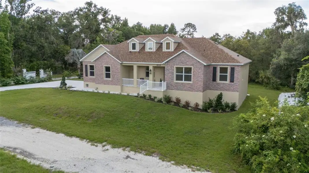 Front exterior of a new home in , Riverview, FL, highlighting curb appeal (Image 31). Front exterior of a new home in , Riverview, FL, highlighting curb appeal (Image 31).