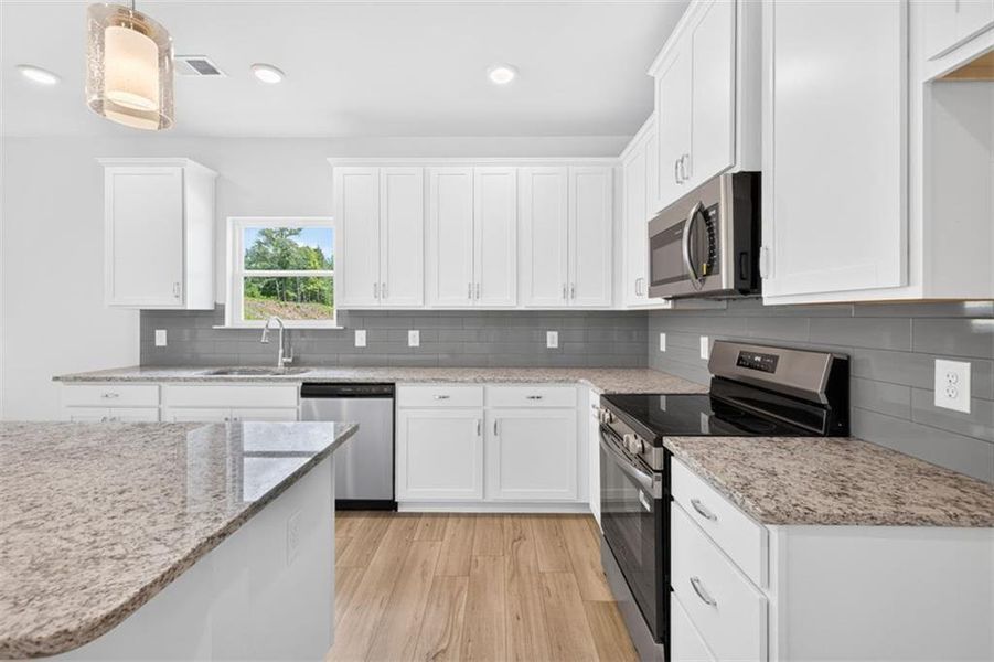 Furnished interior view inside a new home in Summerfield Place, Carrollton (Image 8).
