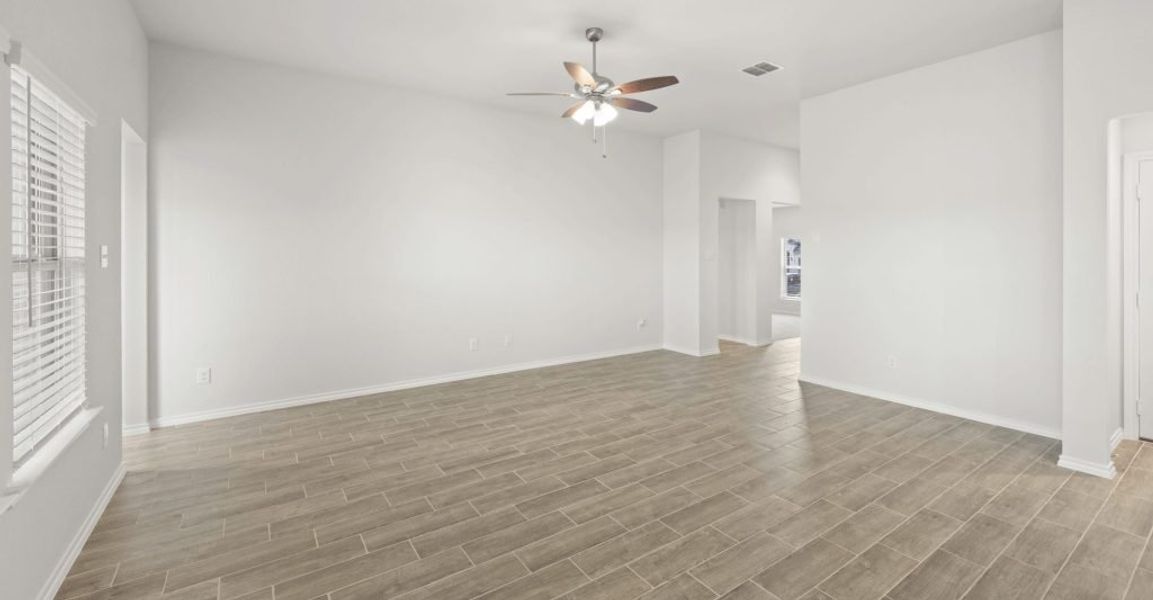 Representative exterior photo of a completed home built from the Pembridge II by Impression Homes in Mountain Valley, Burleson, TX (Image 12). Representative exterior photo of a completed home built from the Pembridge II by Impression Homes in Mountain Valley, Burleson, TX (Image 12).