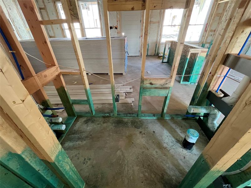 In-progress construction of a new home in The Cottages at Lariat, Liberty Hill, TX (Image 22).