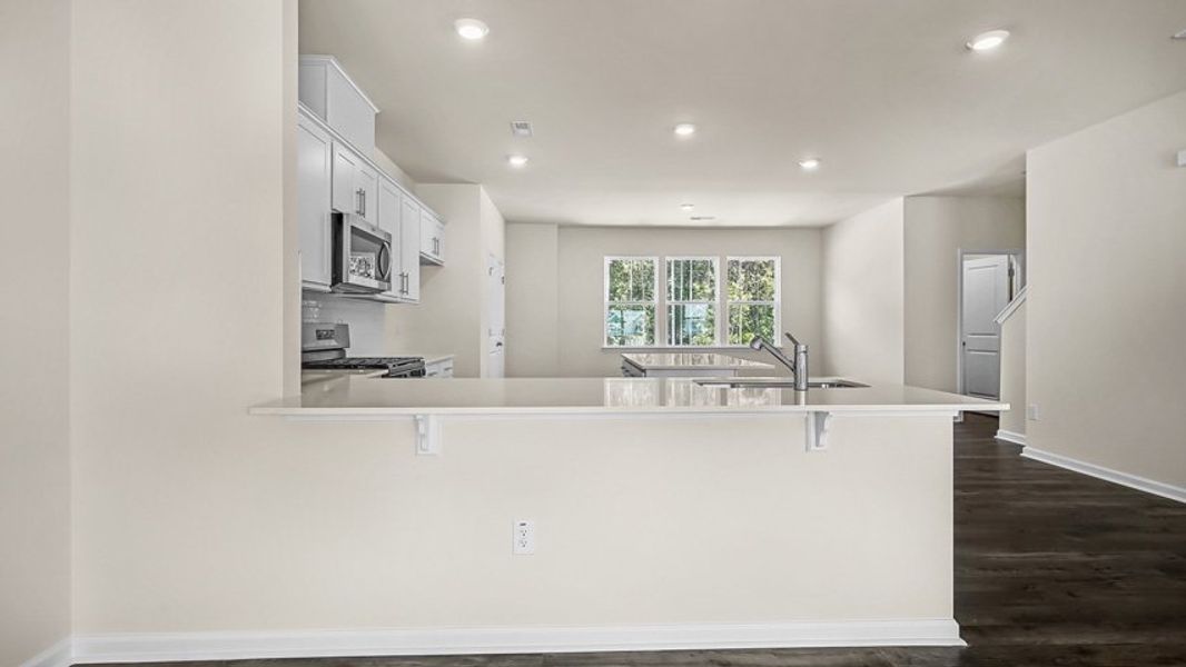 Furnished interior view inside a new home in The Townes at Madden West, Fuquay Varina (Image 3).