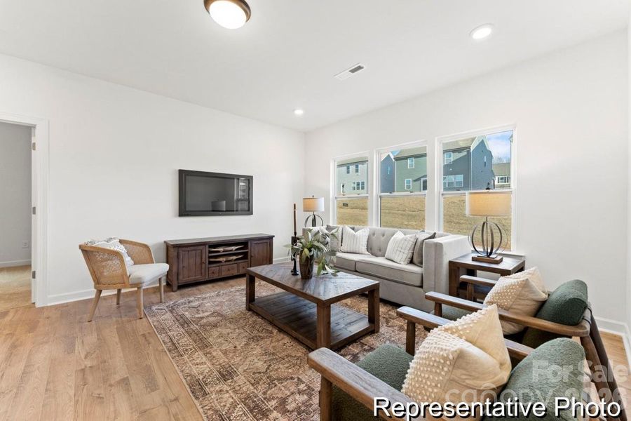Furnished interior view inside a new home in Whispering Hills, Locust (Image 9).