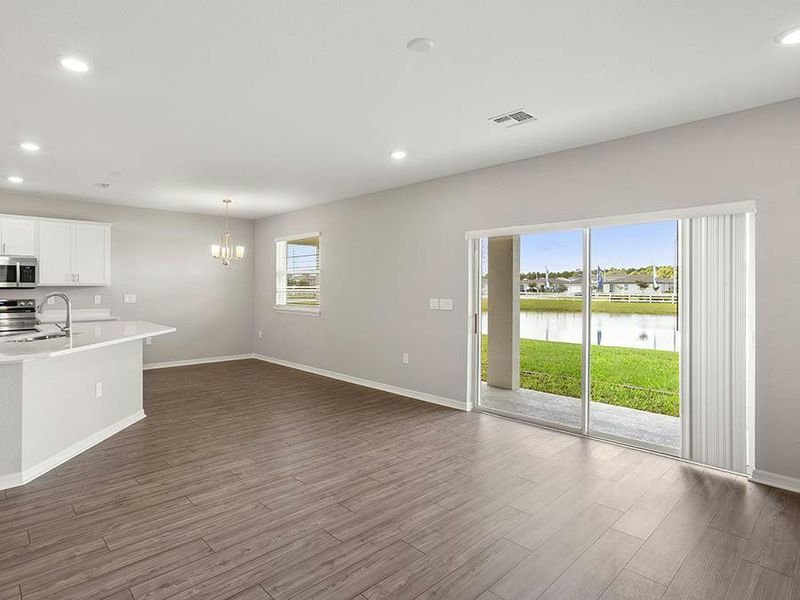 Your new home features a bright and welcoming open-concept living area - Seabrooke ll by Highland Homes