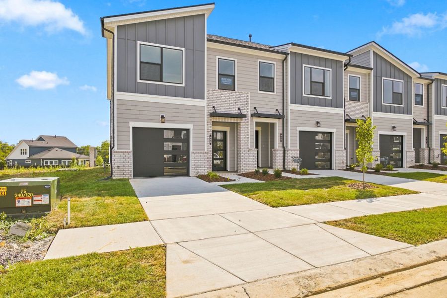 Front exterior of a new home in Nexus Townhomes, Gallatin, TN, highlighting curb appeal (Image 20).