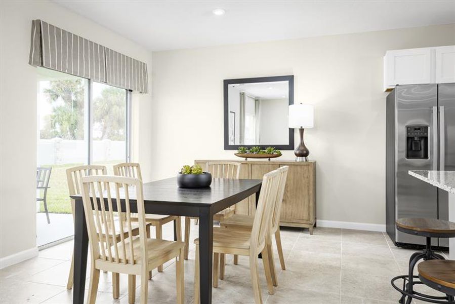 Representative furnished interior of a home built from the Palm by Ryan Homes in Heritage Station, Punta Gorda (Image 4).