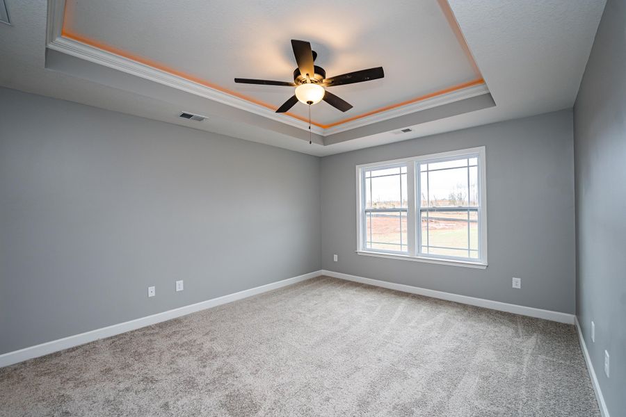 Representative unfurnished interior of a home built from the Saxon by Enchanted Homes in Guadalupe Heights, Seguin (Image 25).