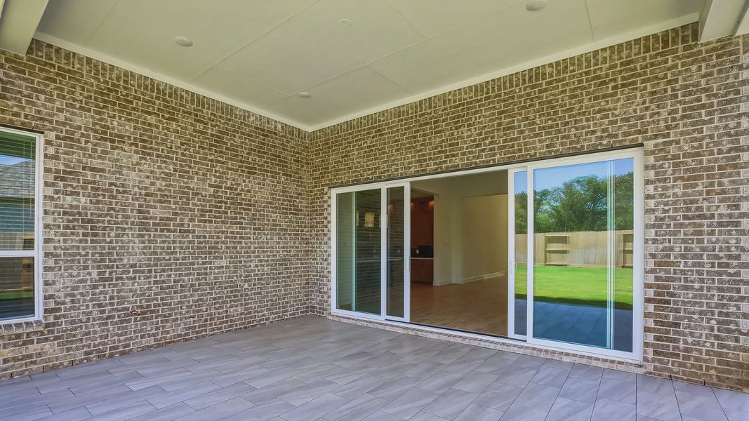 Exterior details and patio area of a home in Riceland 60',65',70', Mont Belvieu (Image 4).
