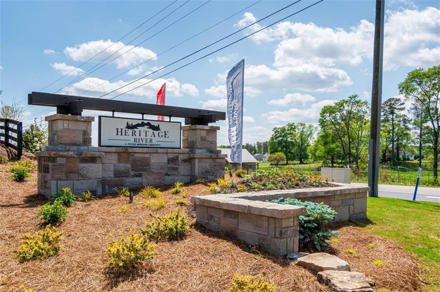 Front exterior of a new home in Heritage River, Euharlee, GA, highlighting curb appeal (Image 6).