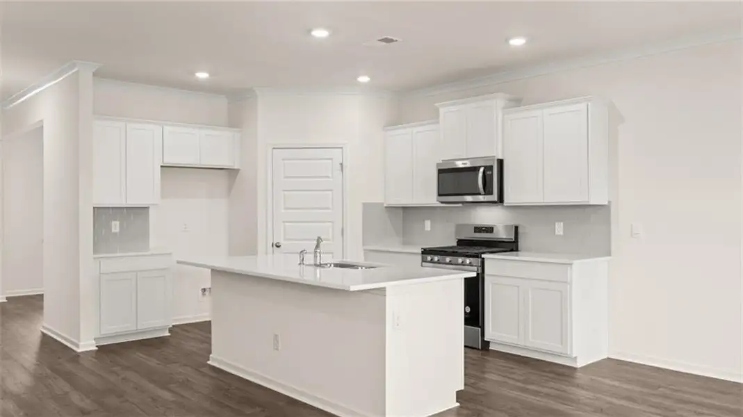 Furnished interior view inside a new home in The Preserve at Agricultural Village, Perry (Image 6).