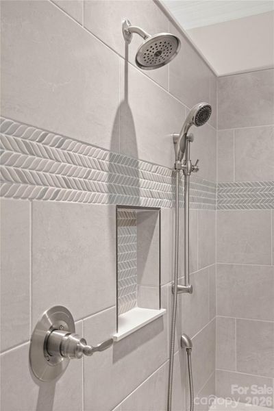 Beautifully tile primary zero entry shower.