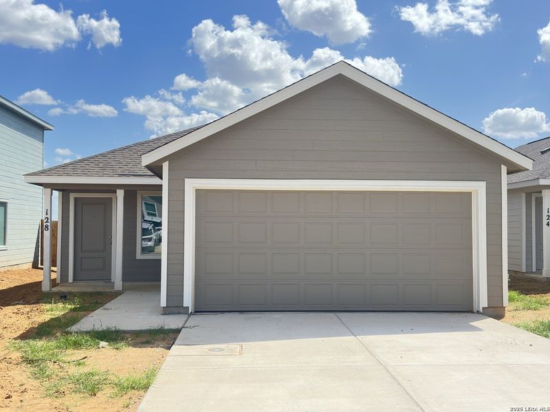 Front exterior of a new home in Pleasanton Meadows, Pleasanton, TX, highlighting curb appeal (Image 1). Front exterior of a new home in Pleasanton Meadows, Pleasanton, TX, highlighting curb appeal (Image 1).