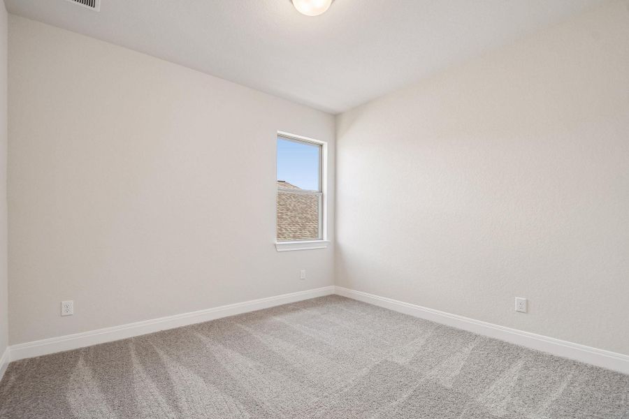 Spacious, unfurnished interior of a new home in 6 Creeks, Kyle (Image 24).