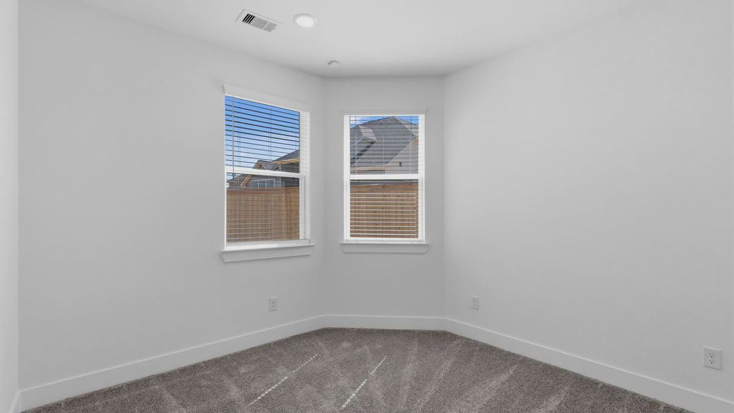 Representative unfurnished interior of a home built from the Oakdale by Chesmar Homes in Bridgeland Courtyard, Cypress (Image 25).