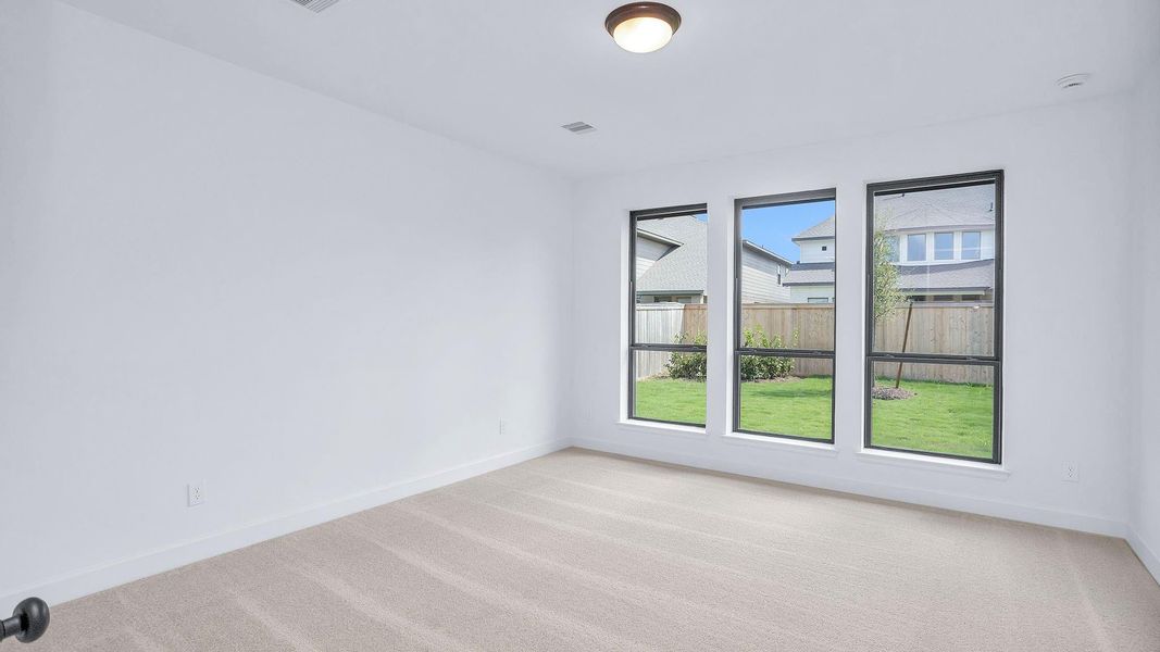 Spacious, unfurnished interior of a new home in Bridgeland, Cypress (Image 8).