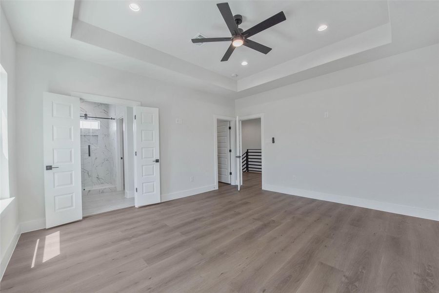A large, light-filled bedroom offers a bright and comfortable retreat. A large, light-filled bedroom offers a bright and comfortable retreat.