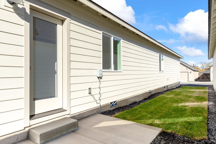 Exterior details and patio area of a home in Feather Ridge, Redmond (Image 2). Exterior details and patio area of a home in Feather Ridge, Redmond (Image 2).