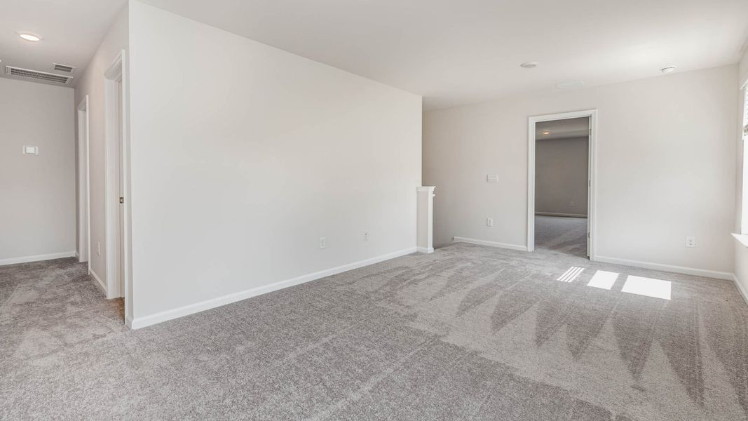 Representative unfurnished interior of a home built from the WREN by D.R. Horton in Cedar Hill Landing, Navassa (Image 23).