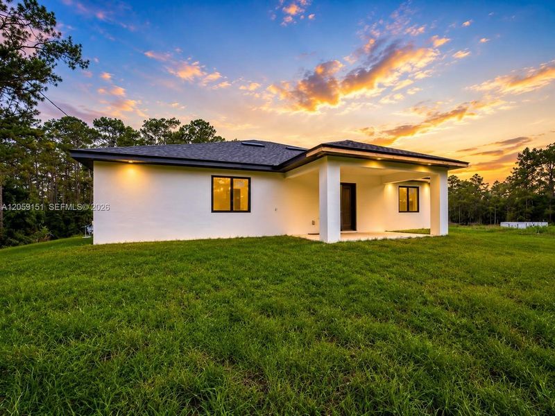 Exterior details and patio area of a home in , Lehigh Acres (Image 3).