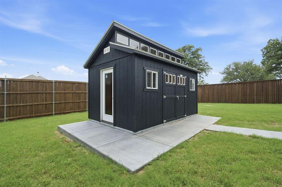 Exterior details and patio area of a home in Covenant Springs, Springtown (Image 23).