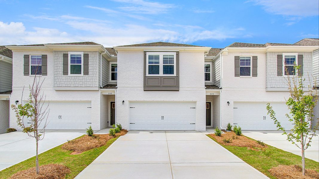 Representative exterior photo of a completed home built from the Austin by DRB Homes in Bowers Farm Townhomes, McDonough, GA (Image 22).