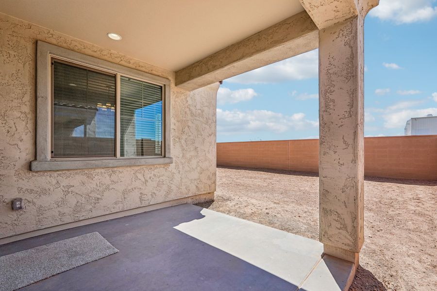 Exterior details and patio area of a home in Hawes Crossing, Mesa (Image 3).