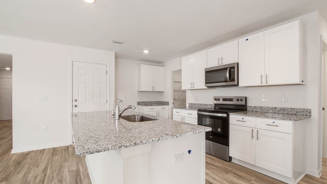 Representative furnished interior of a home built from the Robie by D.R. Horton in Riverwalk, Freeport (Image 6).