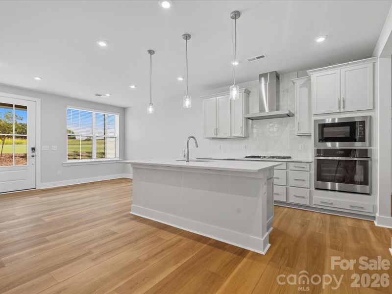 Gourmet kitchen with white cabinets Gourmet kitchen with white cabinets