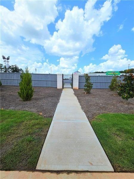 Exterior details and patio area of a home in Magnolia Square, Austell (Image 15).