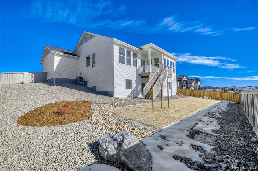 Exterior details and patio area of a home in Sterling Ranch Homestead, Colorado Springs (Image 17).