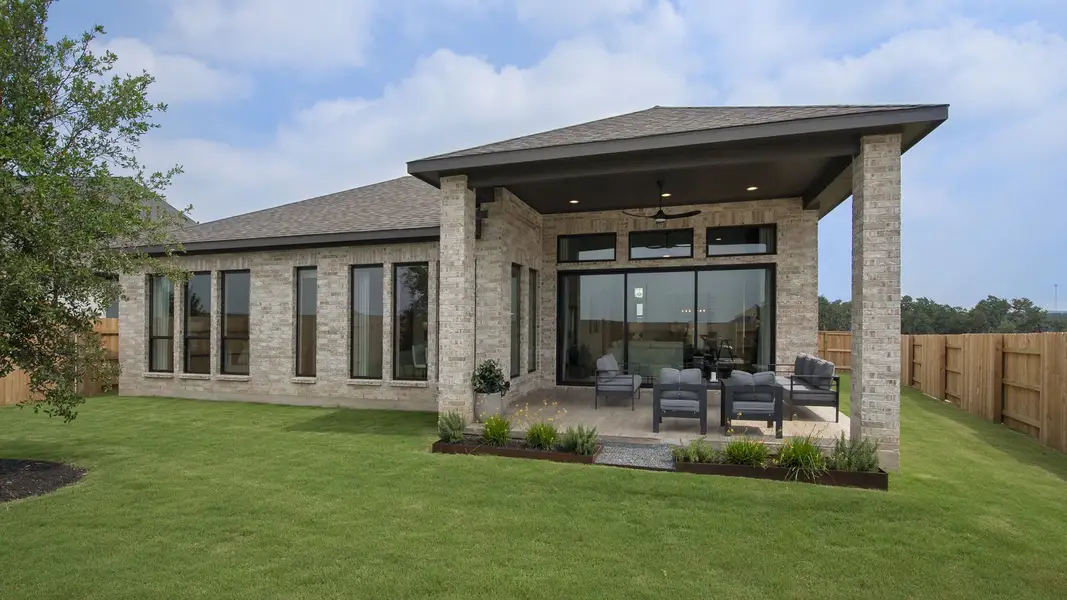 Exterior details and patio area of a home in Trinity Falls, McKinney (Image 4).