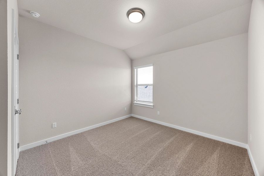 Bedroom in the Magnolia home plan by Trophy Signature Homes – REPRESENTATIVE PHOTO Bedroom in the Magnolia home plan by Trophy Signature Homes – REPRESENTATIVE PHOTO