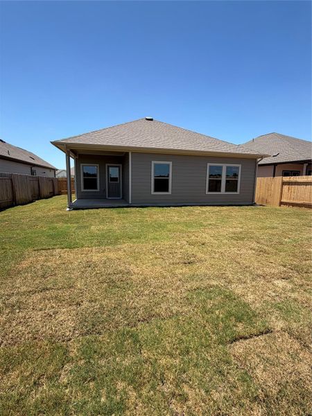 Rear of Home and Private Backyard