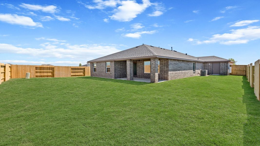Exterior details and patio area of a home in Sunterra Lakes, Brookshire (Image 17). Exterior details and patio area of a home in Sunterra Lakes, Brookshire (Image 17).