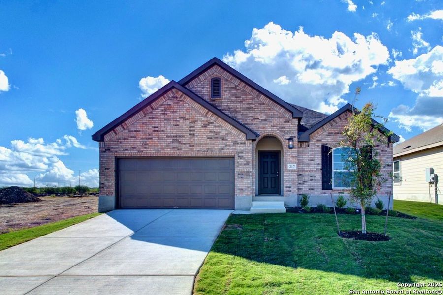 Front exterior of a home in the Westridge - Premier community, located in San Antonio, TX (Image 1).