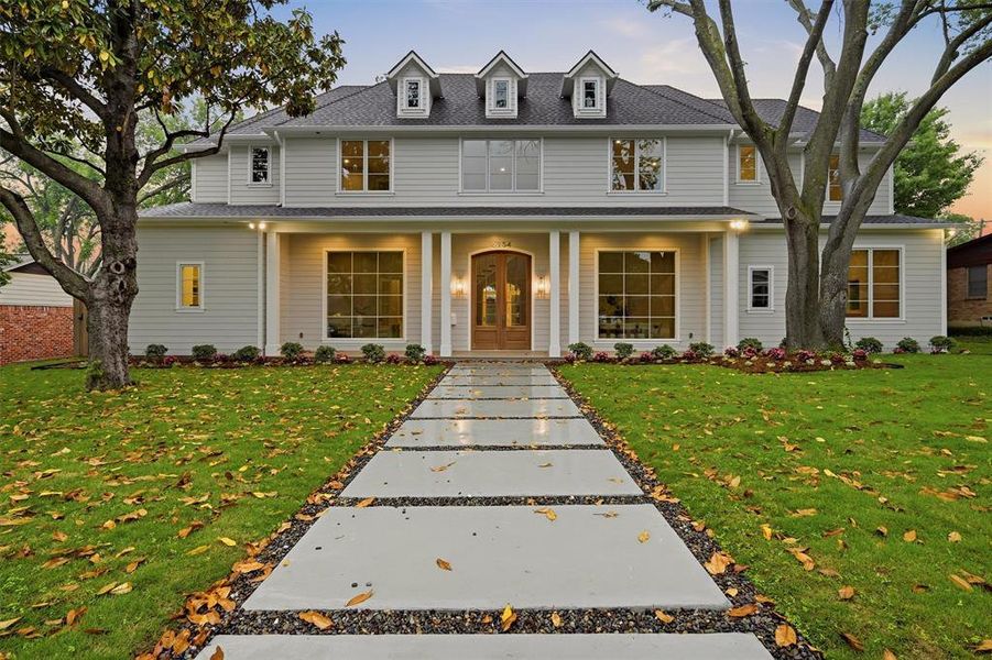 Front exterior of a new home in , Dallas, TX, highlighting curb appeal (Image 26).