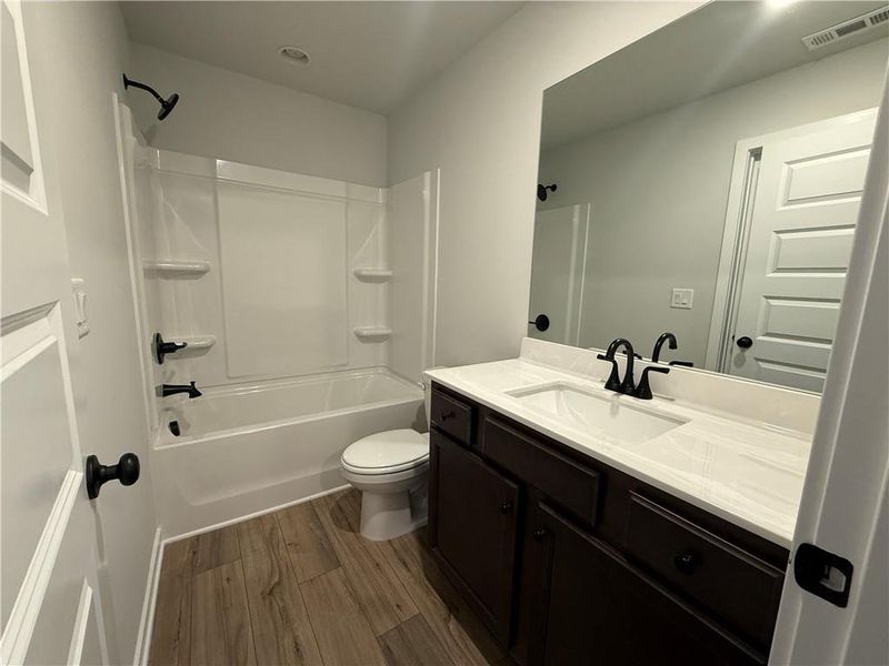 Furnished interior view inside a new home in The Towns at Auburn Station East, Auburn (Image 7).