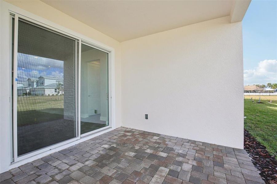 Exterior details and patio area of a home in Lagoon Residences at Epperson, Wesley Chapel (Image 3).