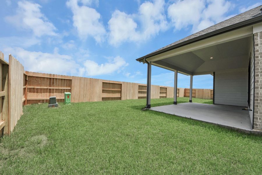 Explore the expansive backyard with its inviting covered patio—a perfect blend of space for the kids to play and adults to unwind. Ideal for creating your outdoor oasis, this backyard accommodates patio furniture, a BBQ pit, and endless possibilities for leisure and entertainment.